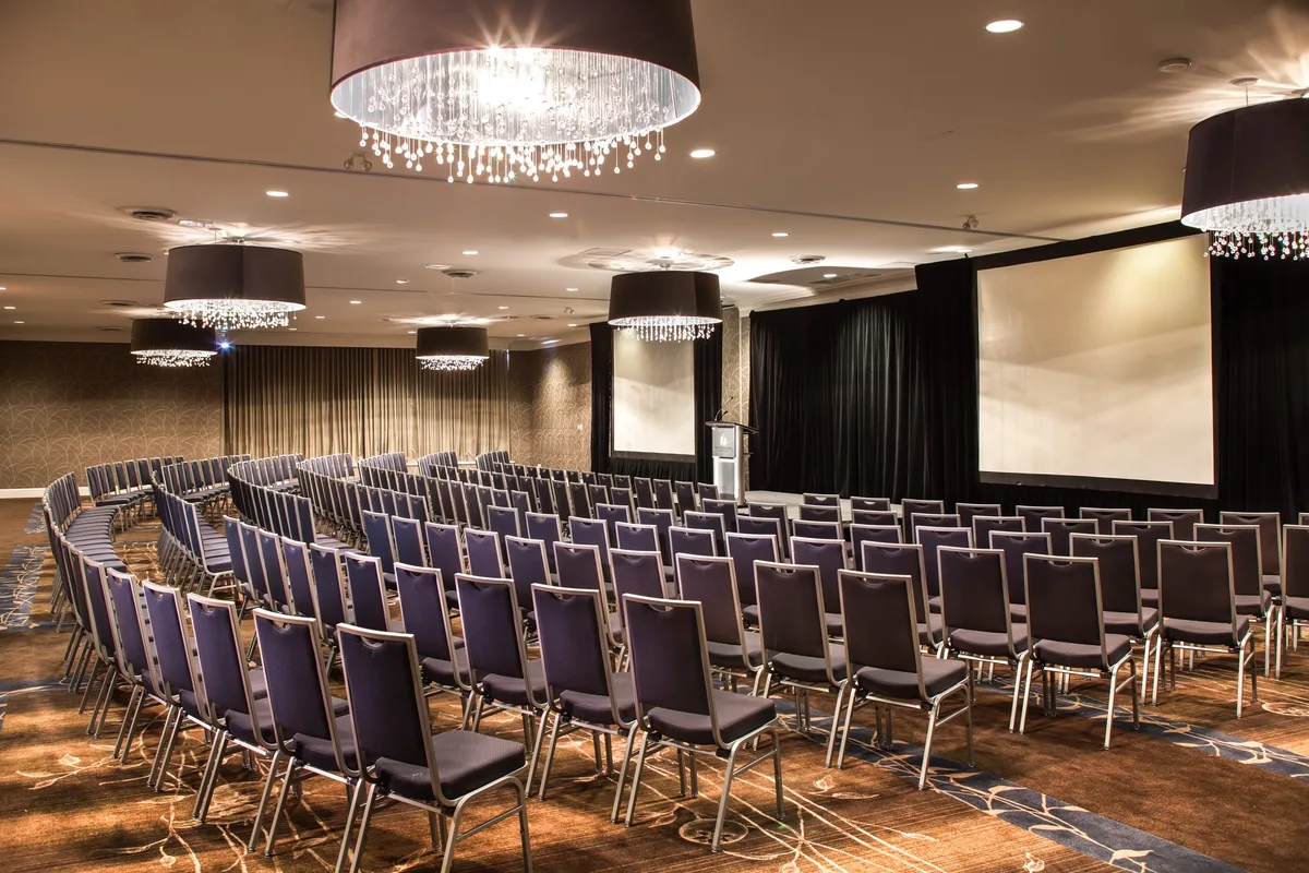 Curved theatre setup in ballroom at the former Pacific Gateway Hotel Vancouver