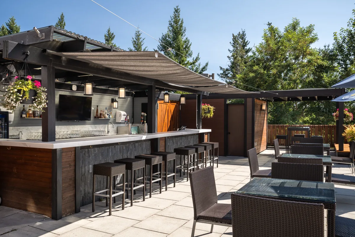 The bar of the rooftop patio at the Four Points Victoria Gateway Hotel